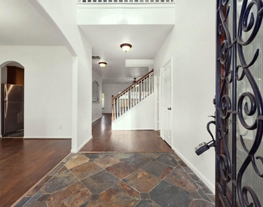 10003 Lynette Falls Drive - Photo Thumbnail 2