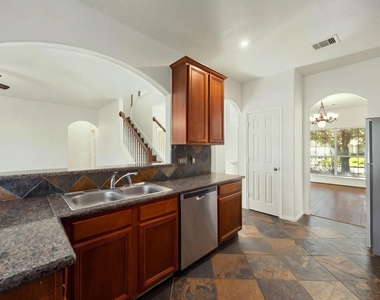 10003 Lynette Falls Drive - Photo Thumbnail 13