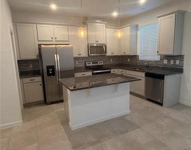 1180 Lakeshore Breeze Place - Photo Thumbnail 6