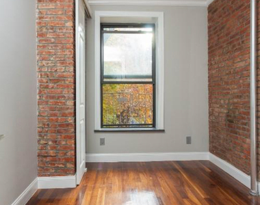 East 116th Street - Photo Thumbnail 1