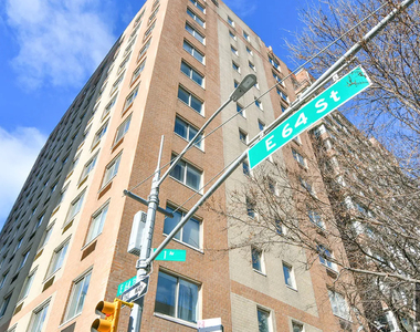 E 64th St - Photo Thumbnail 5