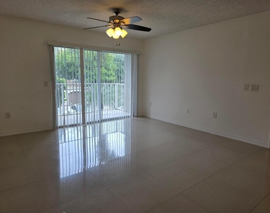 5055 Wiles Road - Photo Thumbnail 9