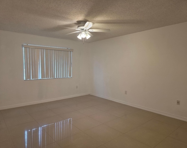 5055 Wiles Road - Photo Thumbnail 13