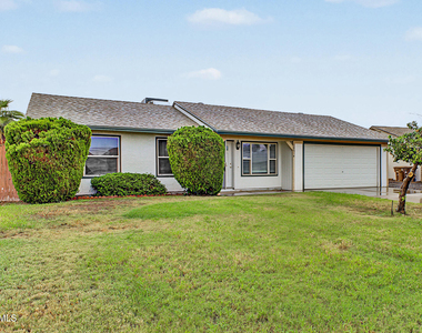 10014 N 87th Lane - Photo Thumbnail 1