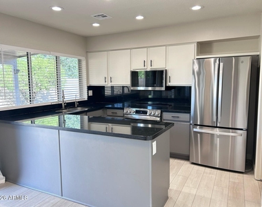 6221 E Gelding Drive - Photo Thumbnail 1