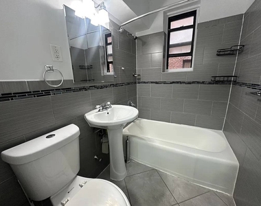 86-11 Whitney Avenue - Photo Thumbnail 1
