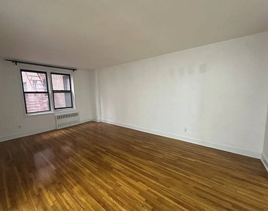 86-11 Whitney Avenue - Photo Thumbnail 2