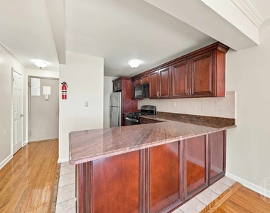 88-25 153rd Street - Photo Thumbnail 2