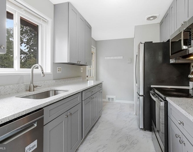7025 Strathmore Street - Photo Thumbnail 24