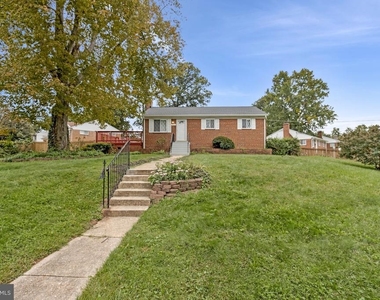 7025 Strathmore Street - Photo Thumbnail 3