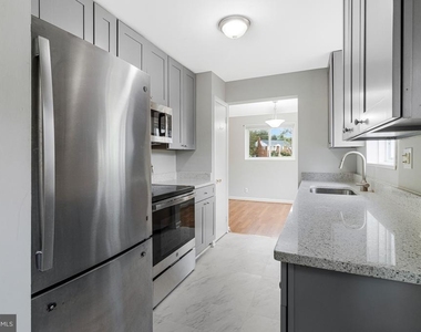 7025 Strathmore Street - Photo Thumbnail 28