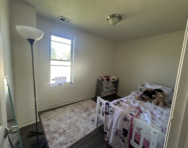 1561 E 93rd Street - Photo Thumbnail 5