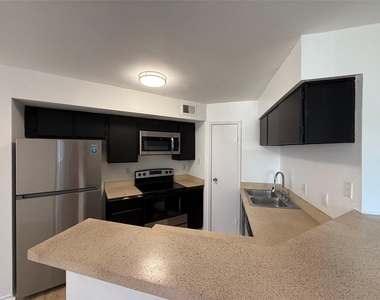 7200 W T C Jester Boulevard - Photo Thumbnail 1