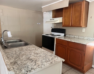 5912 Skylane Drive - Photo Thumbnail 2