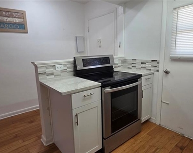 1433 S Belcher Road - Photo Thumbnail 3