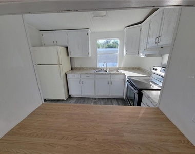 10386 Se 52nd Court - Photo Thumbnail 2
