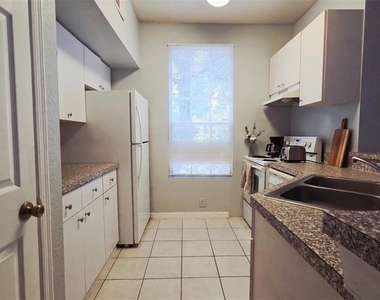 6400 Raleigh Street - Photo Thumbnail 3
