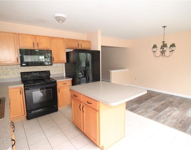 1703 Pinewind Drive - Photo Thumbnail 4
