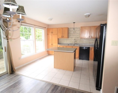 1703 Pinewind Drive - Photo Thumbnail 1