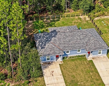 9342/9344 N Peachtree Way - Photo Thumbnail 1