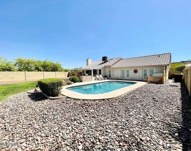 13613 N 19th Place - Photo Thumbnail 2