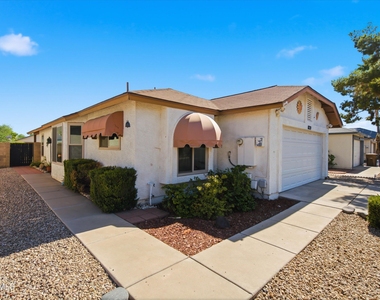 8839 W Bluefield Avenue - Photo Thumbnail 1