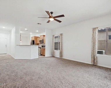 11137 E Sutter Avenue - Photo Thumbnail 2