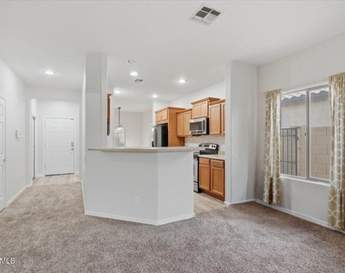 11137 E Sutter Avenue - Photo Thumbnail 3