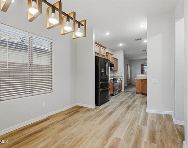 11137 E Sutter Avenue - Photo Thumbnail 5