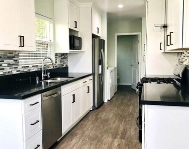 8620 Melvil Street - Photo Thumbnail 3