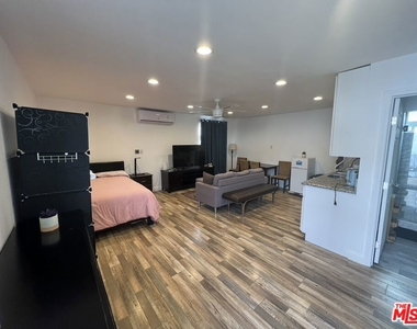 22602 Hatteras Street - Photo Thumbnail 2