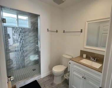 22602 Hatteras Street - Photo Thumbnail 5