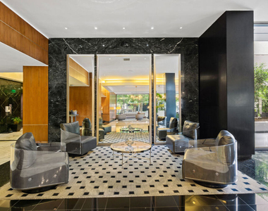 1100 Alta Loma Road - Photo Thumbnail 2