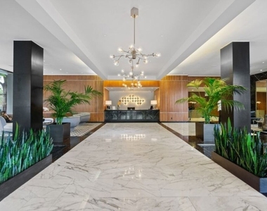1100 Alta Loma Road - Photo Thumbnail 3