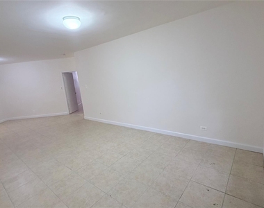 89-20 55th Avenue - Photo Thumbnail 1