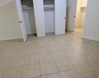 89-20 55th Avenue - Photo Thumbnail 2