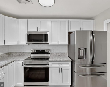 6104 Saint John Drive - Photo Thumbnail 6