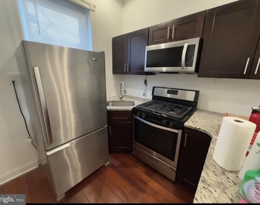 1633 W Girard Avenue - Photo Thumbnail 1
