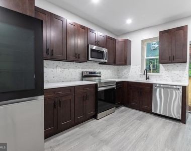 1615 S Conestoga Street - Photo Thumbnail 23