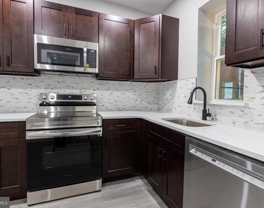1615 S Conestoga Street - Photo Thumbnail 25