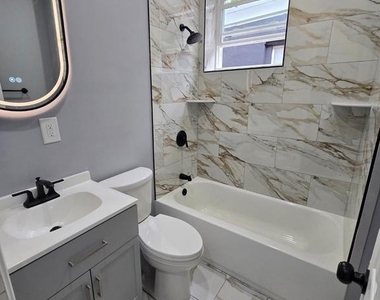 1615 S Conestoga Street - Photo Thumbnail 6