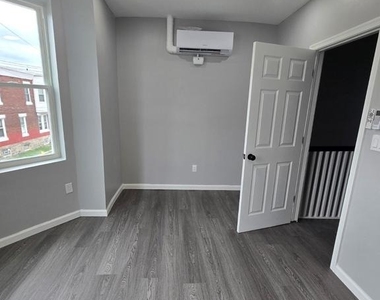 1615 S Conestoga Street - Photo Thumbnail 5