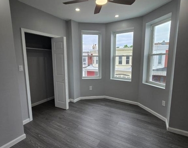 1615 S Conestoga Street - Photo Thumbnail 3