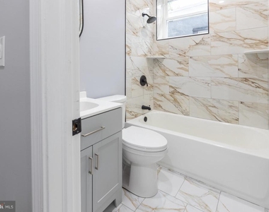 1615 S Conestoga Street - Photo Thumbnail 40