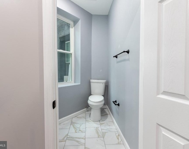 1615 S Conestoga Street - Photo Thumbnail 14