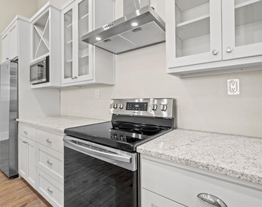 104 E 2nd St - Photo Thumbnail 17