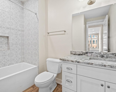 104 E 2nd St - Photo Thumbnail 32