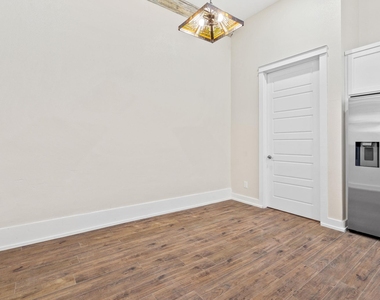 104 E 2nd St - Photo Thumbnail 23