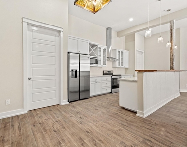 104 E 2nd St - Photo Thumbnail 22