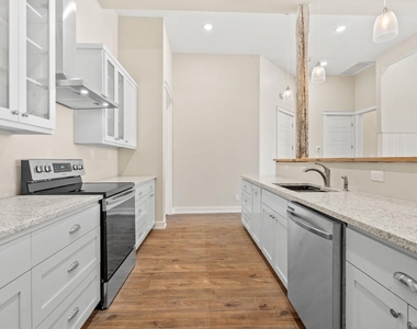 104 E 2nd St - Photo Thumbnail 19